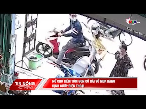 Video Nữ chủ tiệm tóm gọn cô gái vờ mua hàng định cướp điện... - youtube