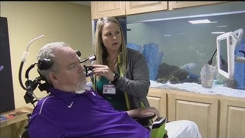 Stroke patient recovering with help from occupational therapist