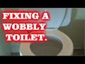 FIXING A WOBBLY TOILET.