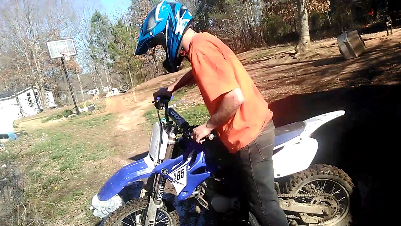 Dad driving a YZ85 dirt bike with power bands YouTube