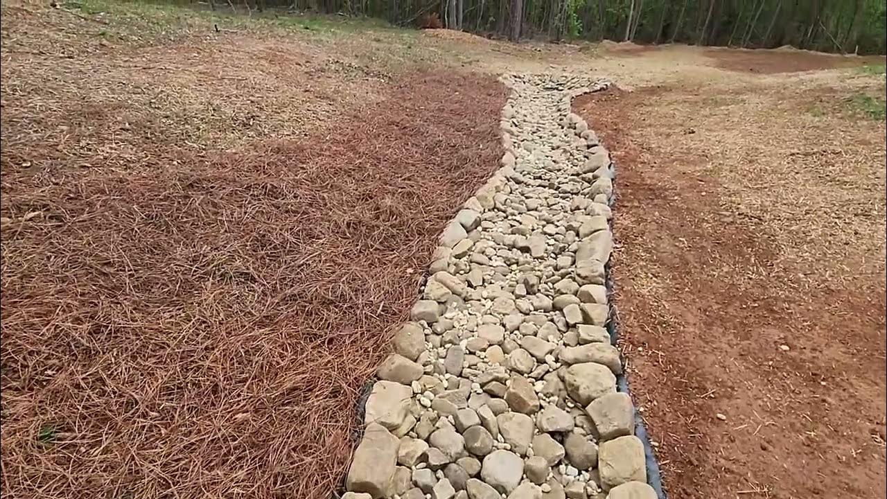 How to Install a Beautiful Dry Creek Bed and solve your landscape