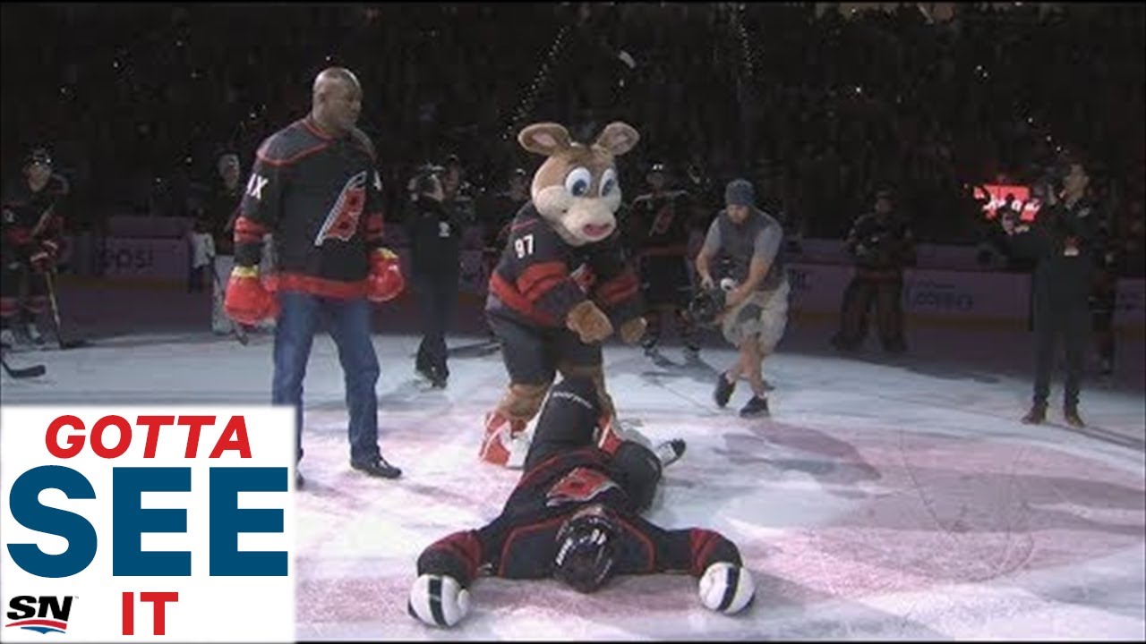 GOTTA SEE IT: Evander Holyfield KOs Jordan Martinook During Hurricanes Celebration