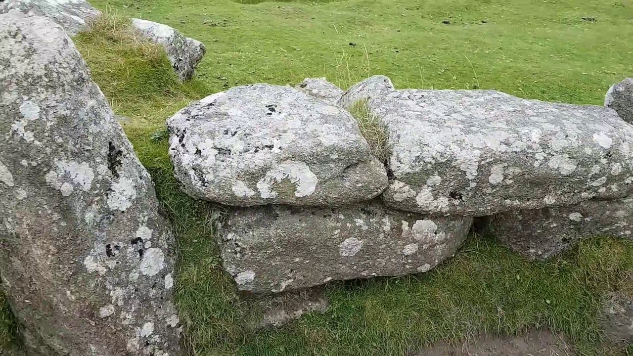 Walking in to a hut circle at Grimspound on Dartmoor