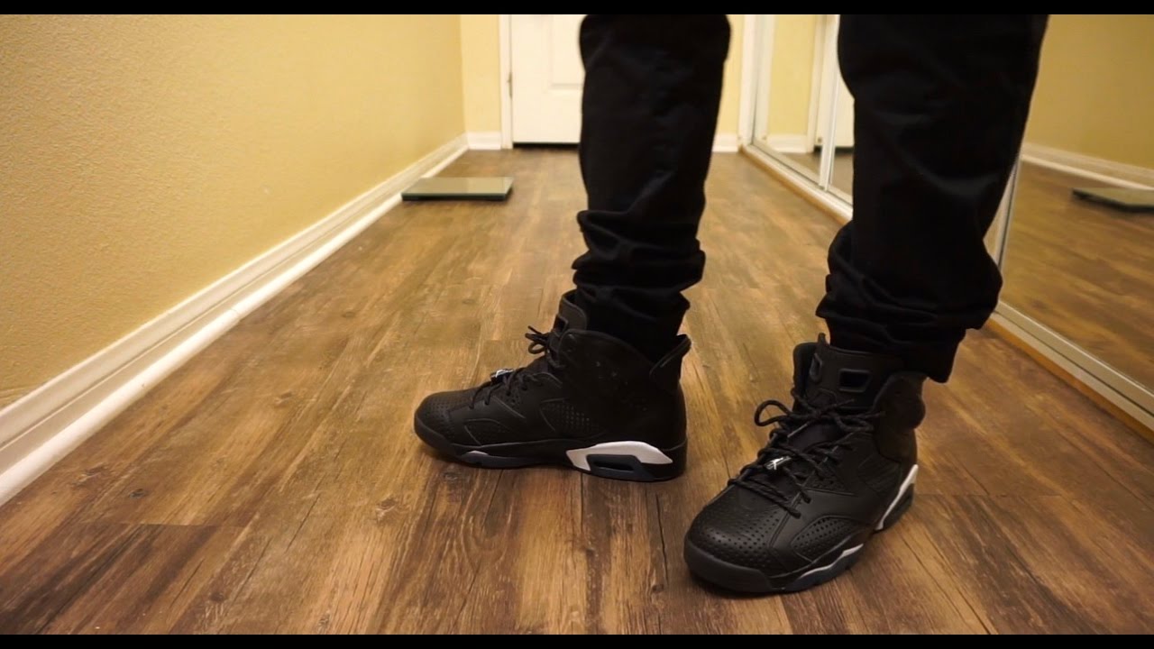 black cat 6s on feet