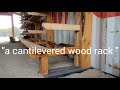 "a cantilevered wood rack"