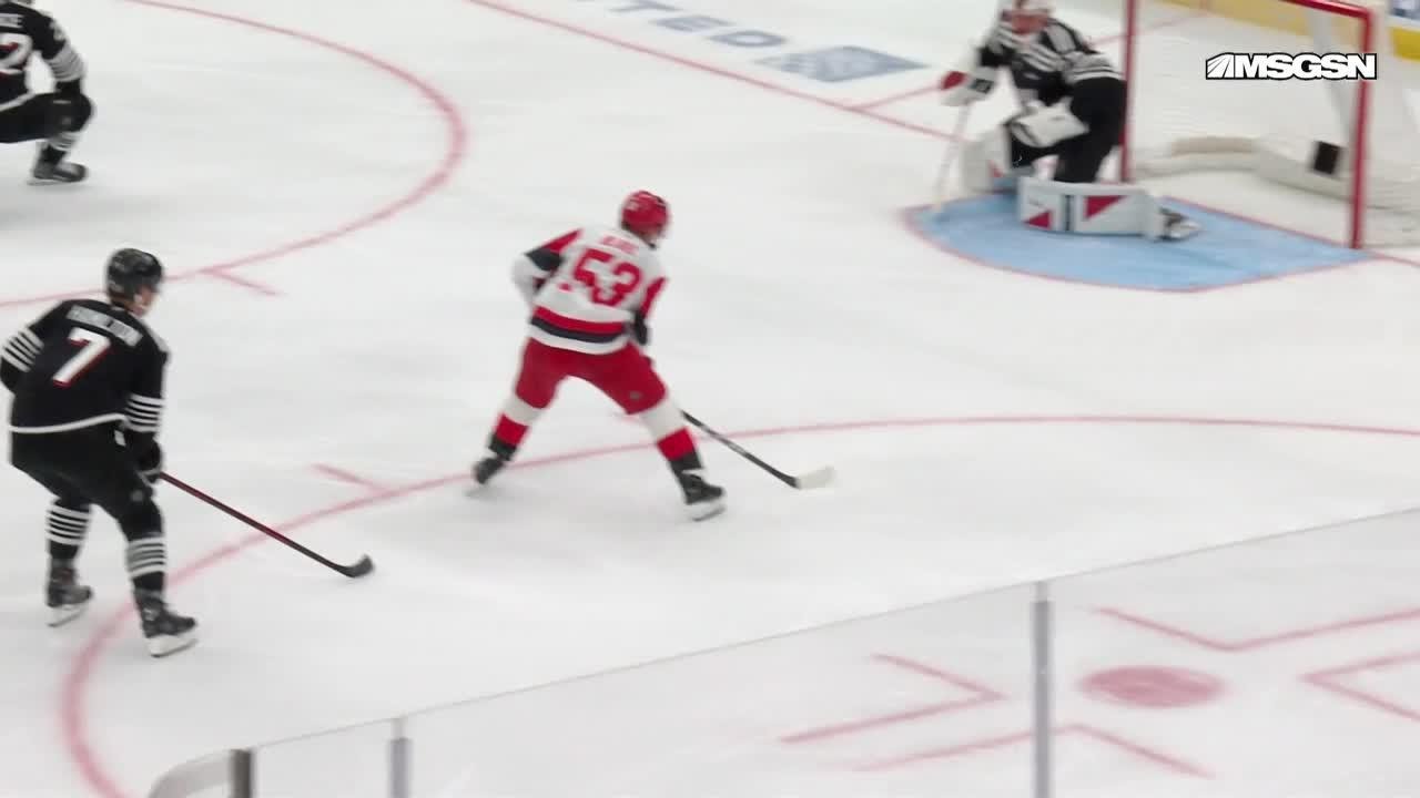 Jackson Blake scores a goal against the New Jersey Devils