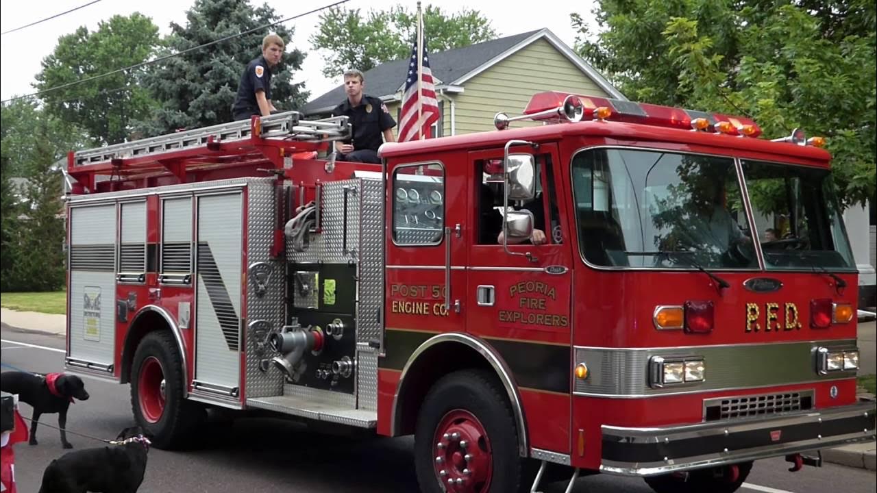 best place to park west peoria fourth of july parade