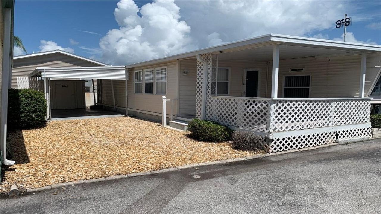 73 TWIN SHORES BOULEVARD, LONGBOAT KEY, FL Presented by Home