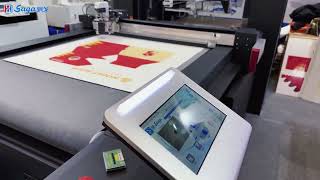 SAGA'S new auto feeding flatbed cutting machine which can cut 7mm thick media paper.