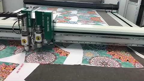 Auto feeding digital cutter for fabric