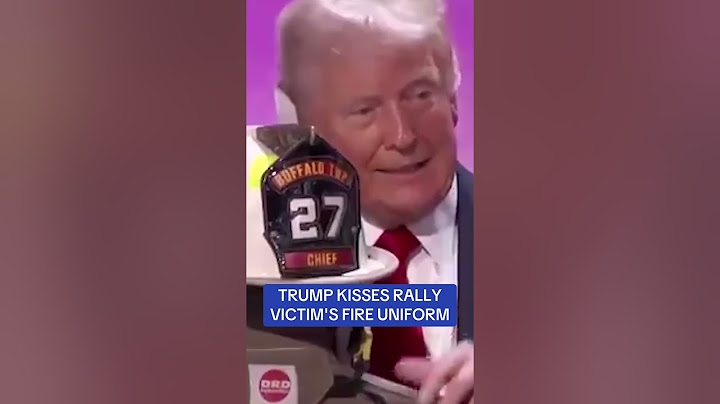 Trump kisses rally shooting victim's fire uniform