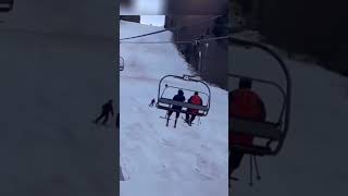 person gets chased by a bear while skiing