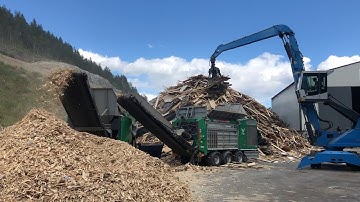 Komptech Terminator and One shredding waste wood