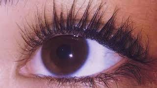 long + curly eyelashes.