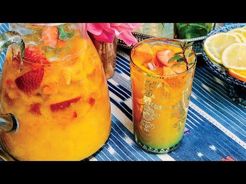 papaya-strawberry-cocktail-|-southern-living