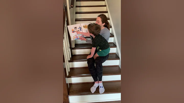 Thomas McCrackens mom reading Dragons Love Tacos