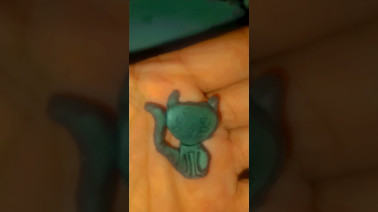 lovely cat with clay