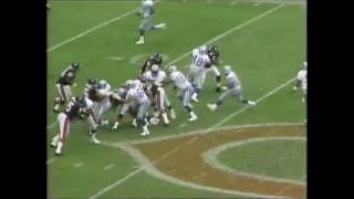 Barry Sanders breaks free from 3-man tackle against Bears. screenshot 2