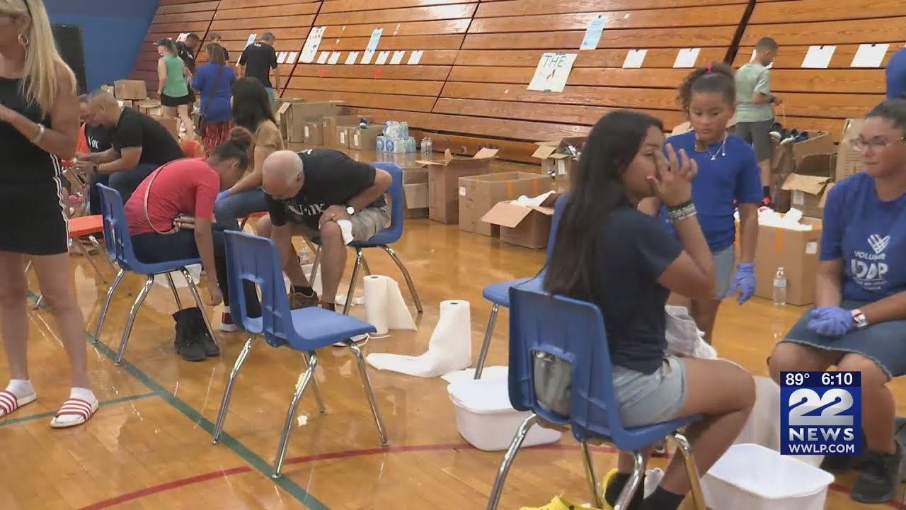 Vox New England Network of Churches donates new sneakers to children in need