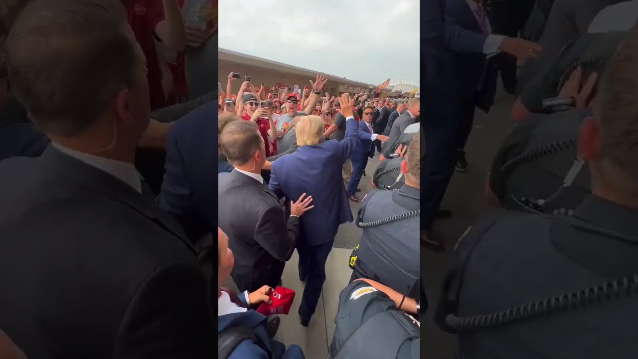 President Trump shakes hands with fans at the Iowa vs. Iowa State football game