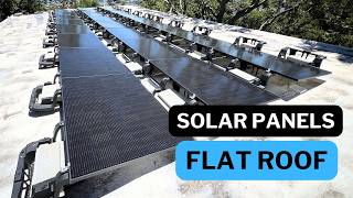 Installing solar panels on flat roof. Ballasted mounting system. Tesla Powerwalls 3