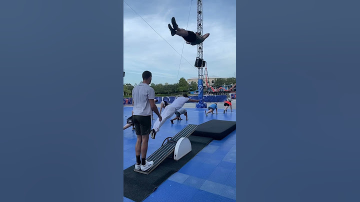 HUGE backflip over an acrobat doing a dive roll!