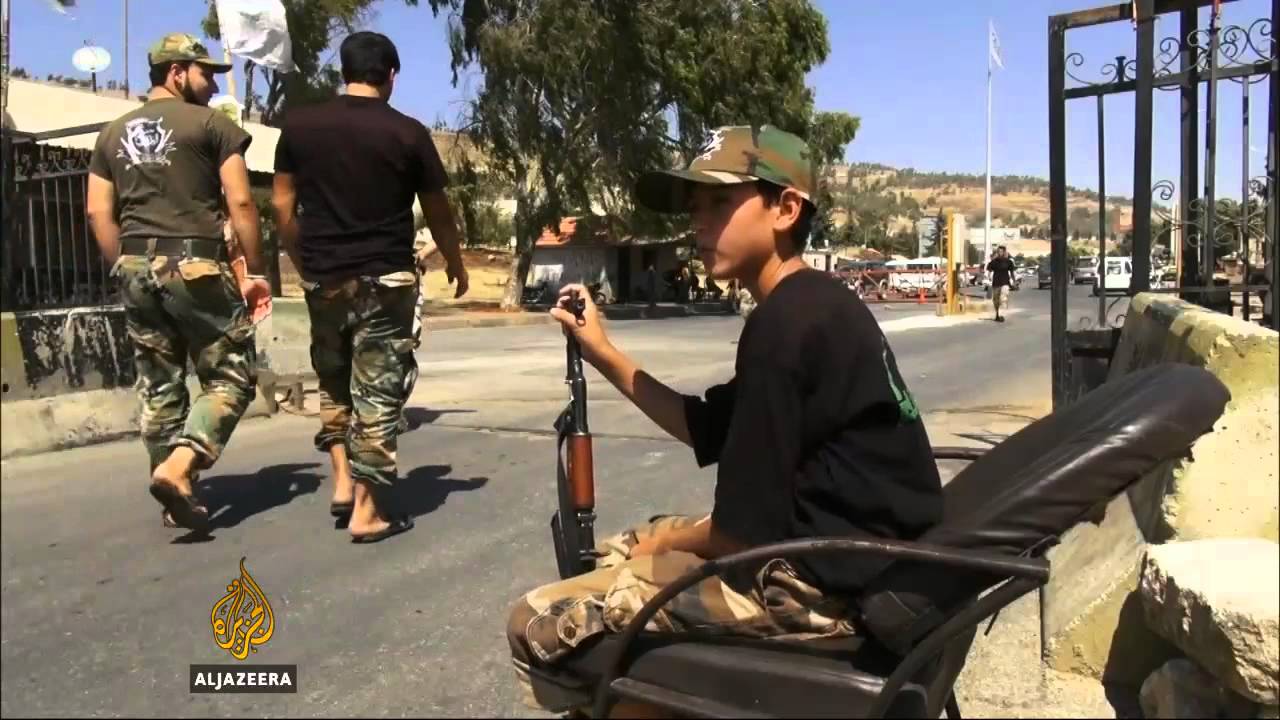 الثوار السوريون يطالبون بالوحدة ضد الأسد