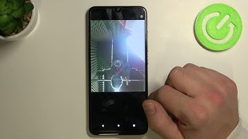 How to Turn On / Turn Off Touch to Capture on MOTOROLA Moto E20 Camera