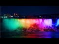 NIAGARA FALLS at Night Illumination Light Show - Niagara Falls New York and Niagara Falls Canada 4K