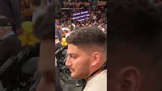 Jimmy Iovine walks past the Game