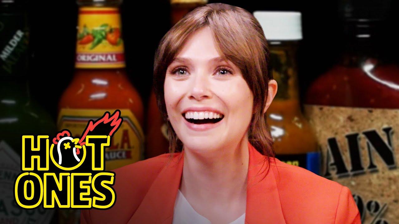 Elizabeth Olsen Feels Brave While Eating Spicy Wings | Hot Ones | First We Feast