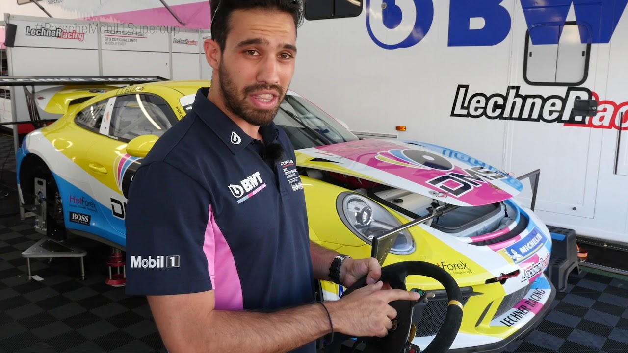 Tio Ellinas explains his steering wheel in the Cup Porsche