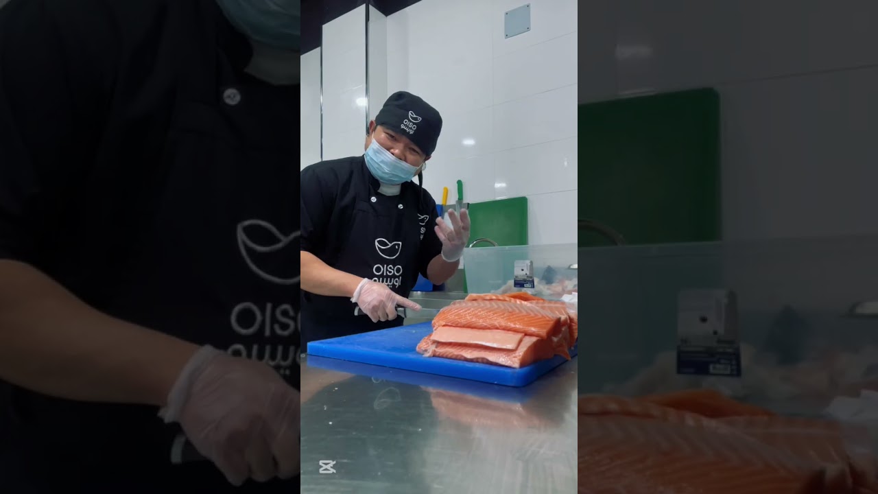 Salmon cutting chef Dee