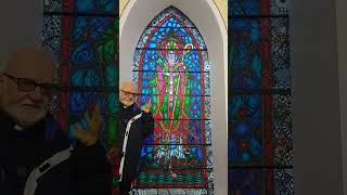 Father John Reveals the symbolism behind the Saint Patrick stained-glass window inside Callow Church