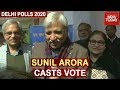 Delhi polls 2020 chief election commissioner sunil arora casts vote at nirman bhawan