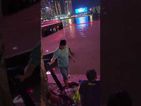 Vietnamese people fishing on the river