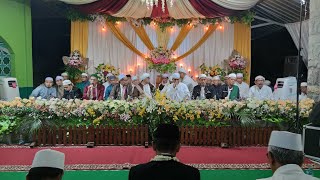QOMARUN - GUS WAHID