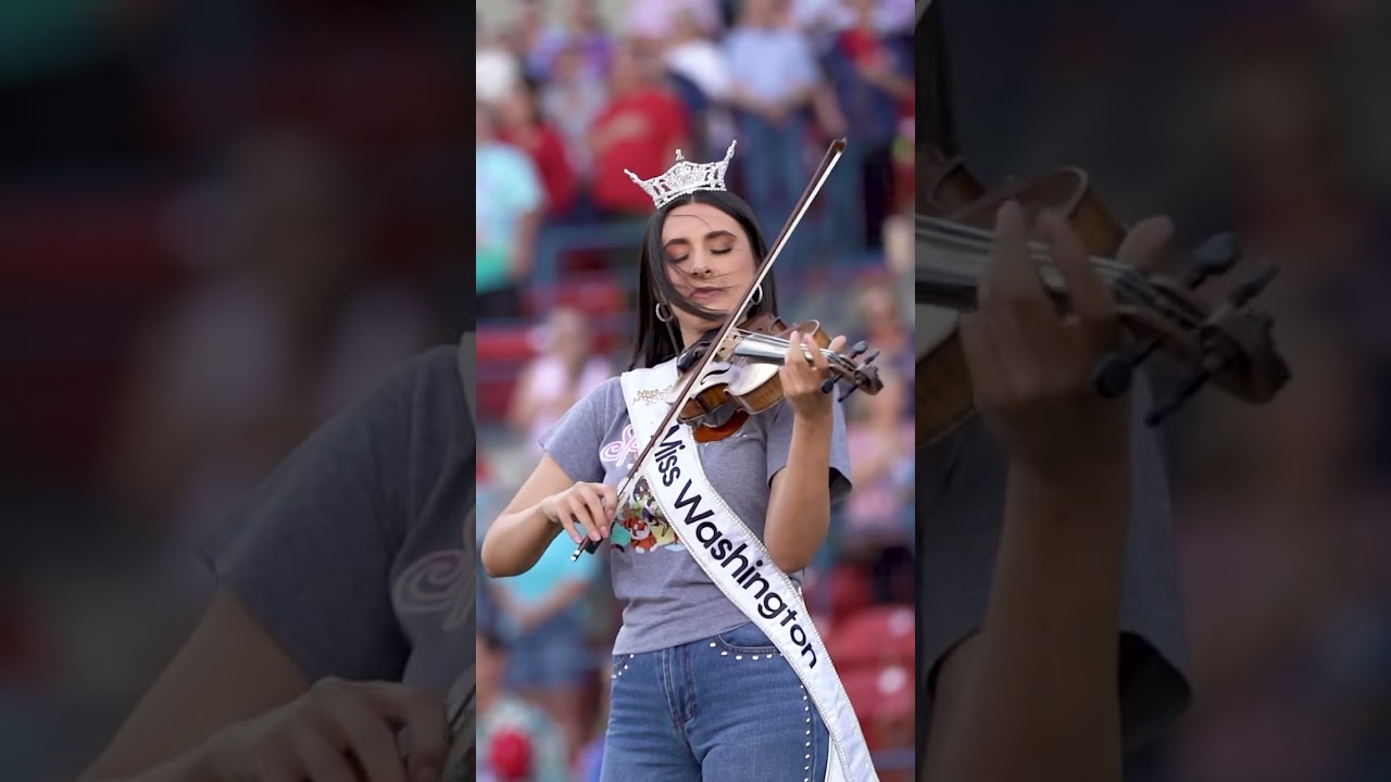 Miss Washington performs the national anthem in front of sellout crowd 