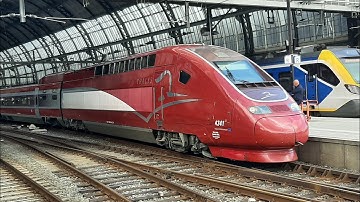 thalys met nieuwe ruby livery vertrekt vanuit Amsterdam Centraal. met luide tyfoon.