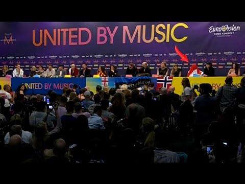 Joost Klein covers his head with flag during Israel's Press Conference!