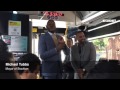 Mayor Michael Tubbs greets visitors at the start of a bus tour of south Stockton and downtown.