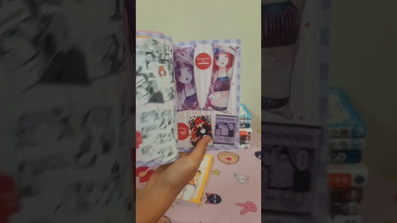 The Quintessential Quintuplets official character books 1 and 2 inside 