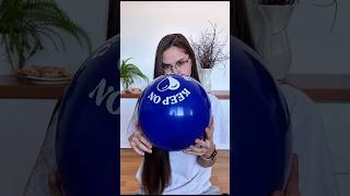 Blowing Blue Balloon..