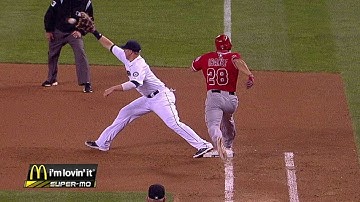 LAA@SEA: Cano charges slow grounder, makes glove flip