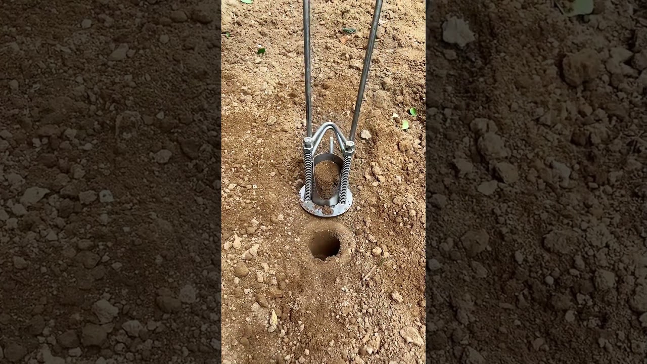 The process of digging holes for planting seedling- Good tools and machinery make work easy