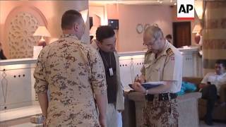 UN observers leave hotel and depart for Lebanon as mission ends