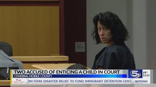 UPDATE: Two charged with "enticing a child" plead not guilty