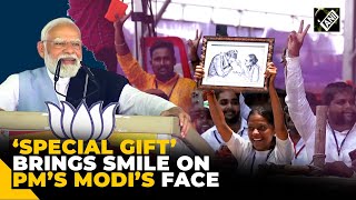 Mother’s portrait by young supporter brings smile on PM Modi’s face in Karnataka’s Bagalkot screenshot 1