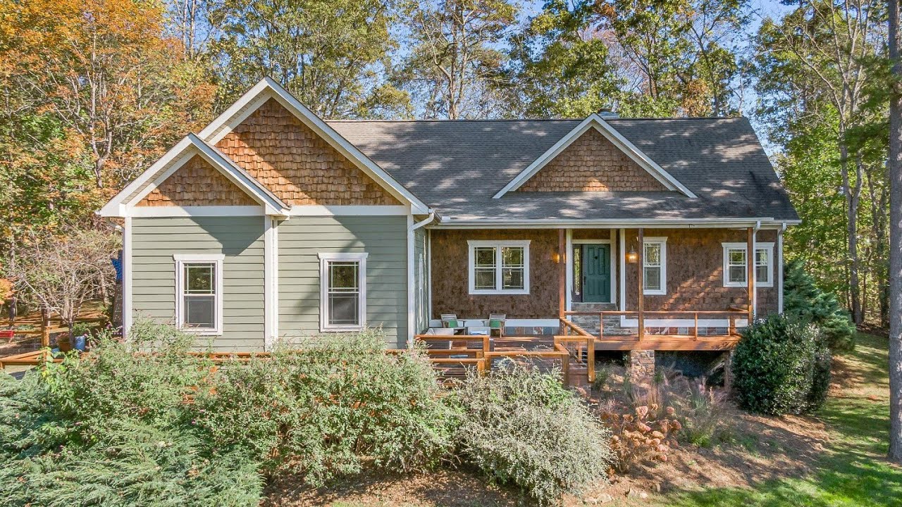 Presented by Eva Hartman and Amy Giles | Nest Realty Asheville: 69 Merrell Road Leicester. NC 28748