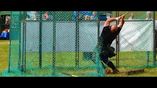 Throwing The Hammer On Visit To Highland Games Blackford Perthshire Scotland